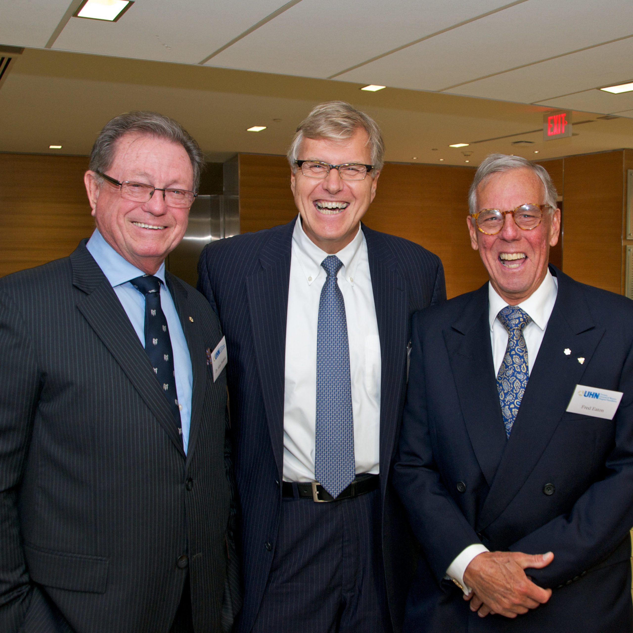 L to R: Former UHN President and CEOs Drs. Alan Hudson and Bob Bell with Fred Eaton at the dedication of the Munk Building at Toronto General Hospital in 2013.